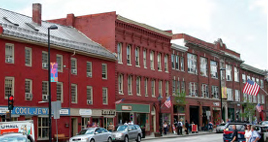 Main Street in Montpelier, Vermont. A mix of shops, offices, and apartments in the city’s downtown: create a neighborhood where residents are close to a lively arts and music scene, restaurants, and businesses. Photograph source: EPA.